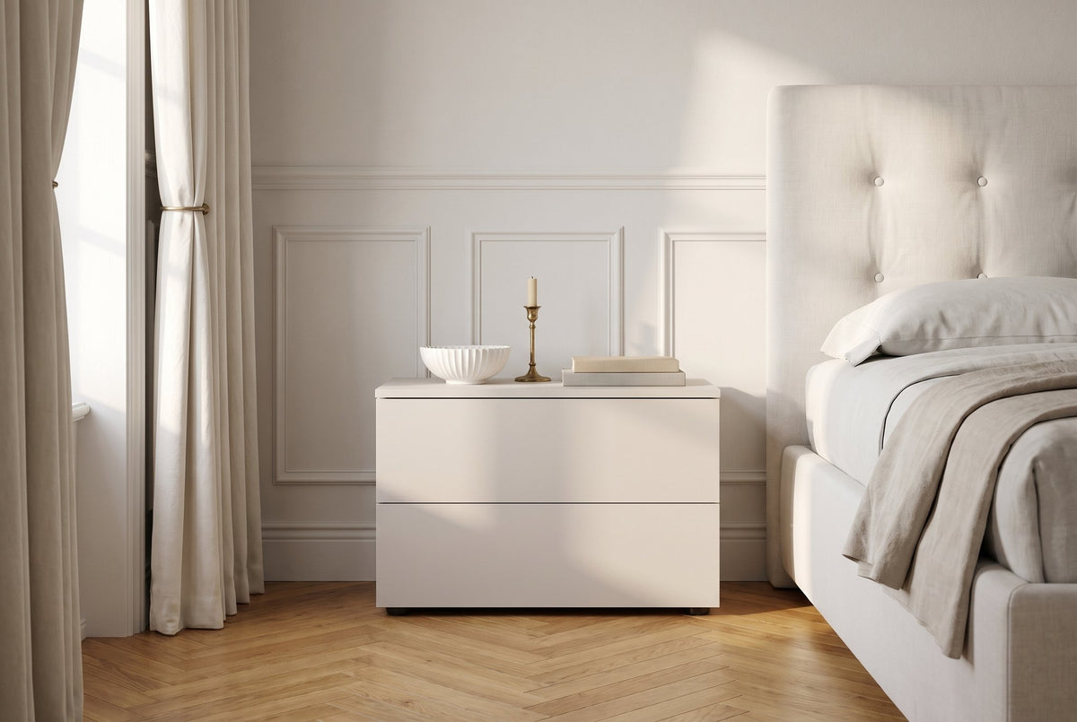 Argo wide bedside table with 2 drawers – Melamine · Perla / Flush with the finish – in a bedroom (AI image)